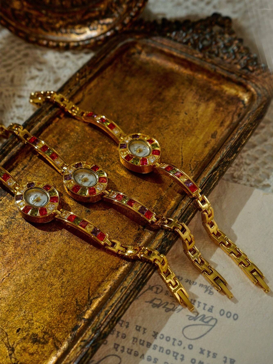 Jewel Reverie β Oval Gold Vintage Inspired Elegant Multicolor Watch